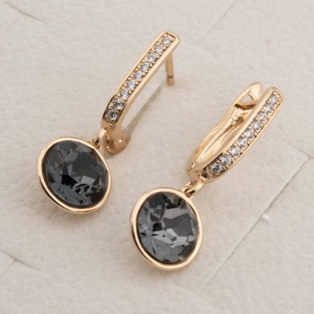 SWAROWSKI auskari apzeltīti