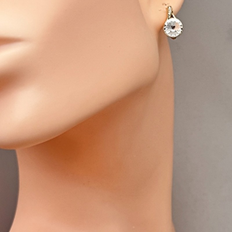 SWAROWSKI auskari apzeltīti