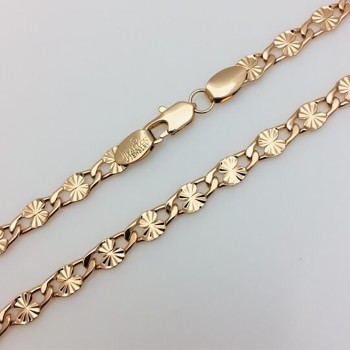 Apzeltītā ķēdīte Iegravētu saules staru ovālu posmu virkne