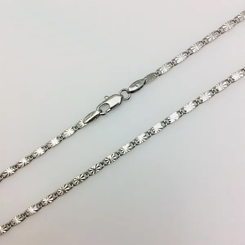 Ķēdīte ar rodija pārklājumu Masīvā gliemežvāka ar saules staru gravējumu posmu virkne