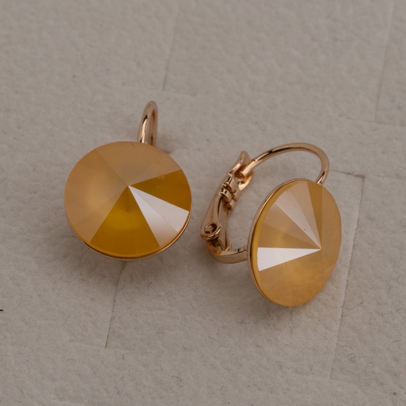 SWAROWSKI auskari apzeltīti