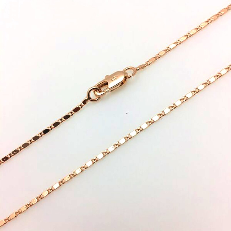 Apzeltītā ķēdīte Smalku pulētu gliemežvāku posmu virkne