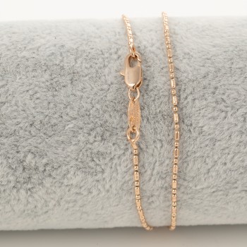 Apzeltītā ķēdīte Bumbiņu un cilindrisku posmu virkne