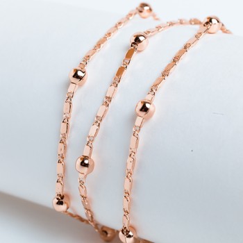 Apzeltītā ķēdīte Bumbiņu un gliemežvāka posmu virkne