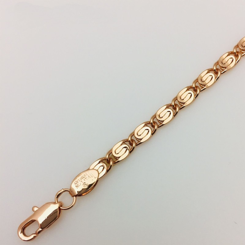 Apzeltītā ķēdīte Klasiskā saplacinātu gliemežu posmu virkne