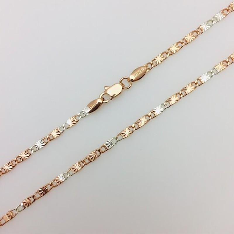 Apzeltītā ķēdīte Masīvā gliemežvāka ar saules staru gravējumu posmu virkne