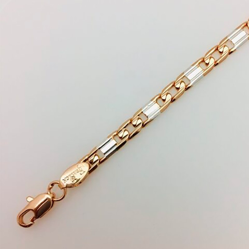 Apzeltītā ķēdīte Spoguļveida kaltu posmu virkne