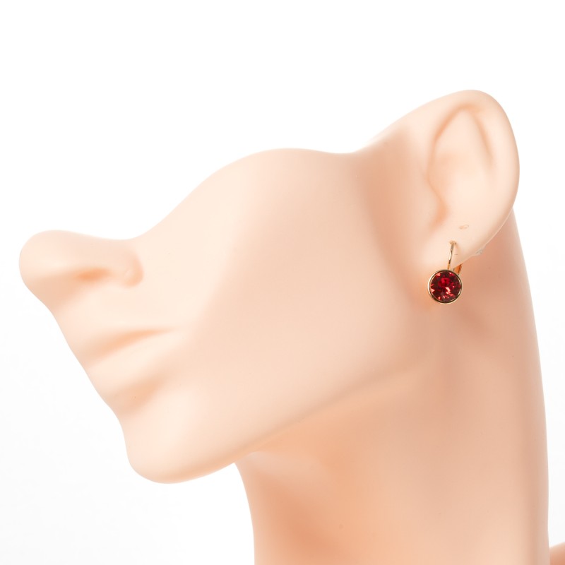 SWAROWSKI auskari apzeltīti